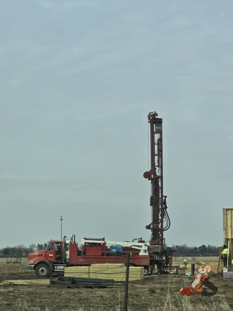 High-capacity well drilling installation for orchard irrigation at Nuts About Dee’s Berries agroforestry farm in Brodhead Wisconsin